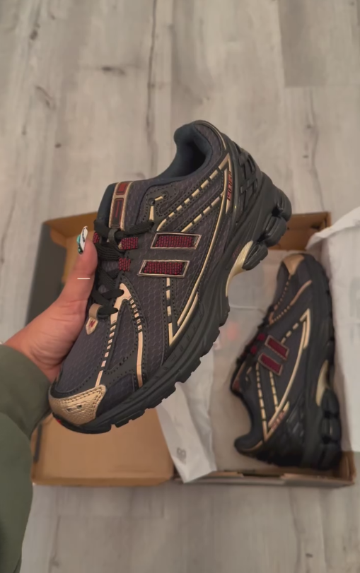 Black and gold-trimmed breathable fleece-lined sneakers