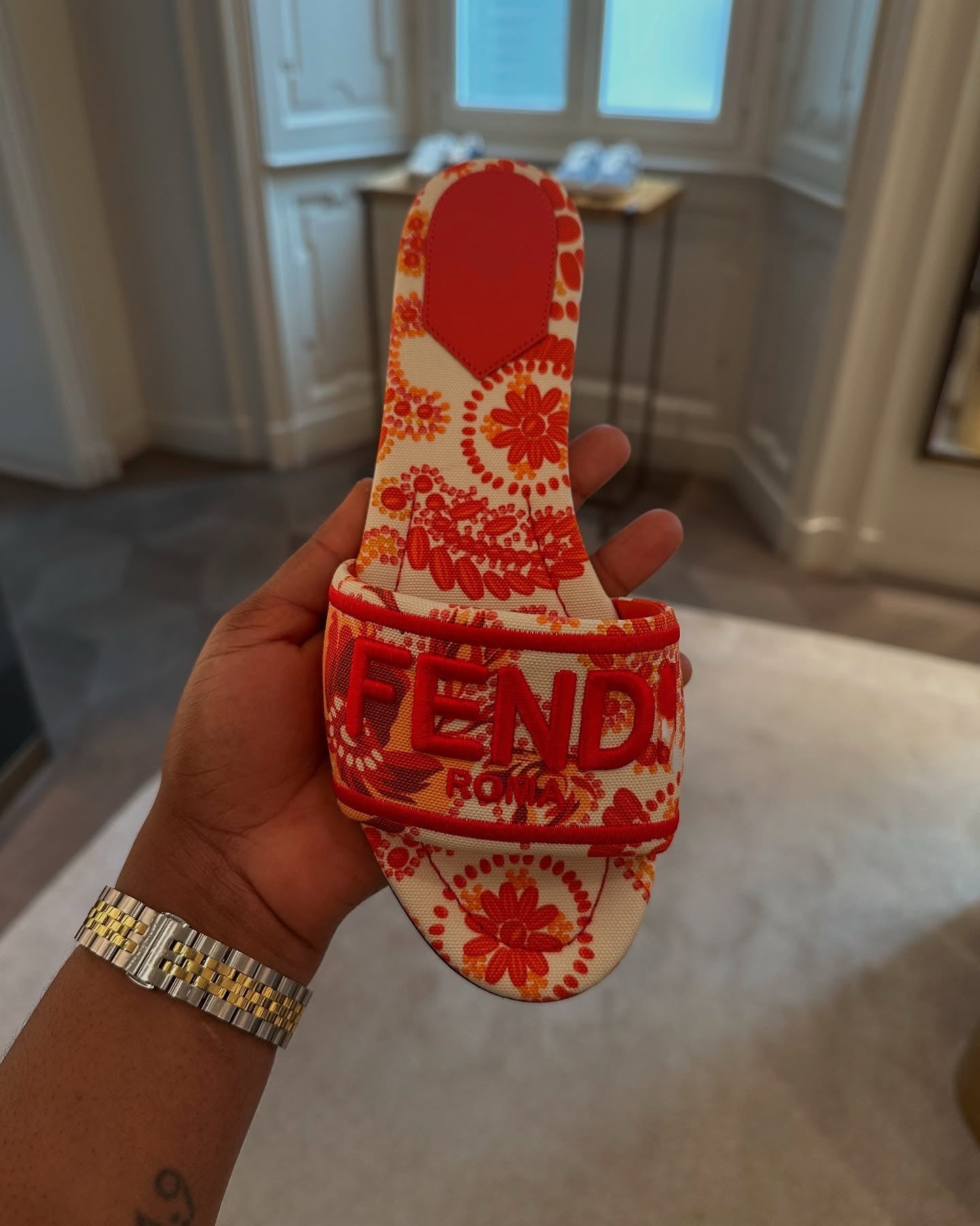 Red and white embroidered sandals