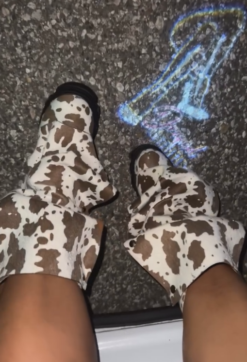 White and brown cow boots