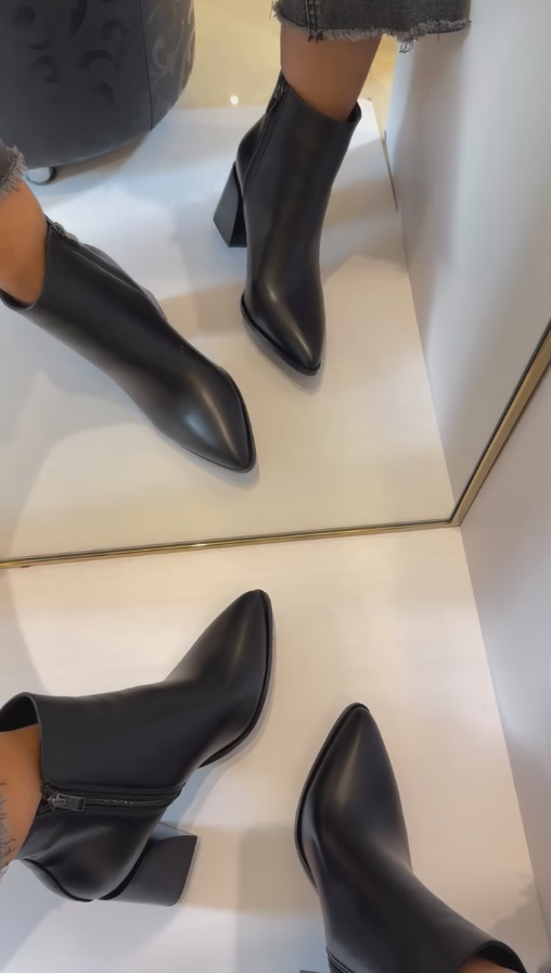 Black metal stripe ankle boots