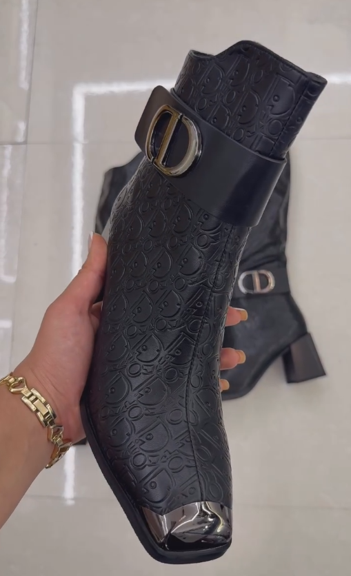 Black engraved iron toe ankle boots