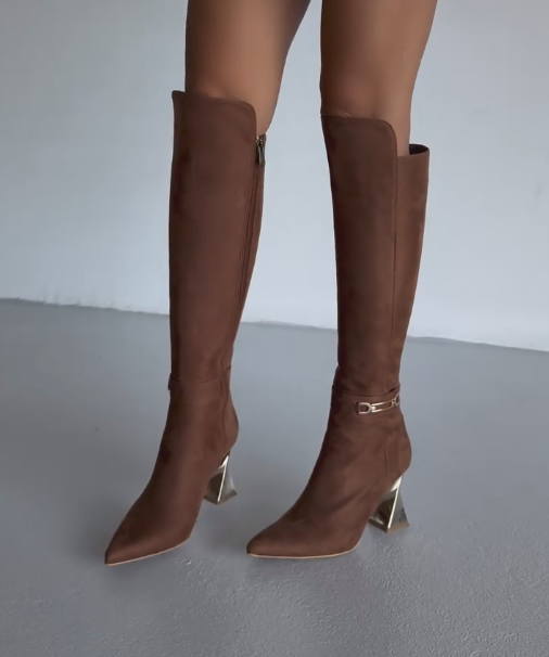Gold rotating heel high boots