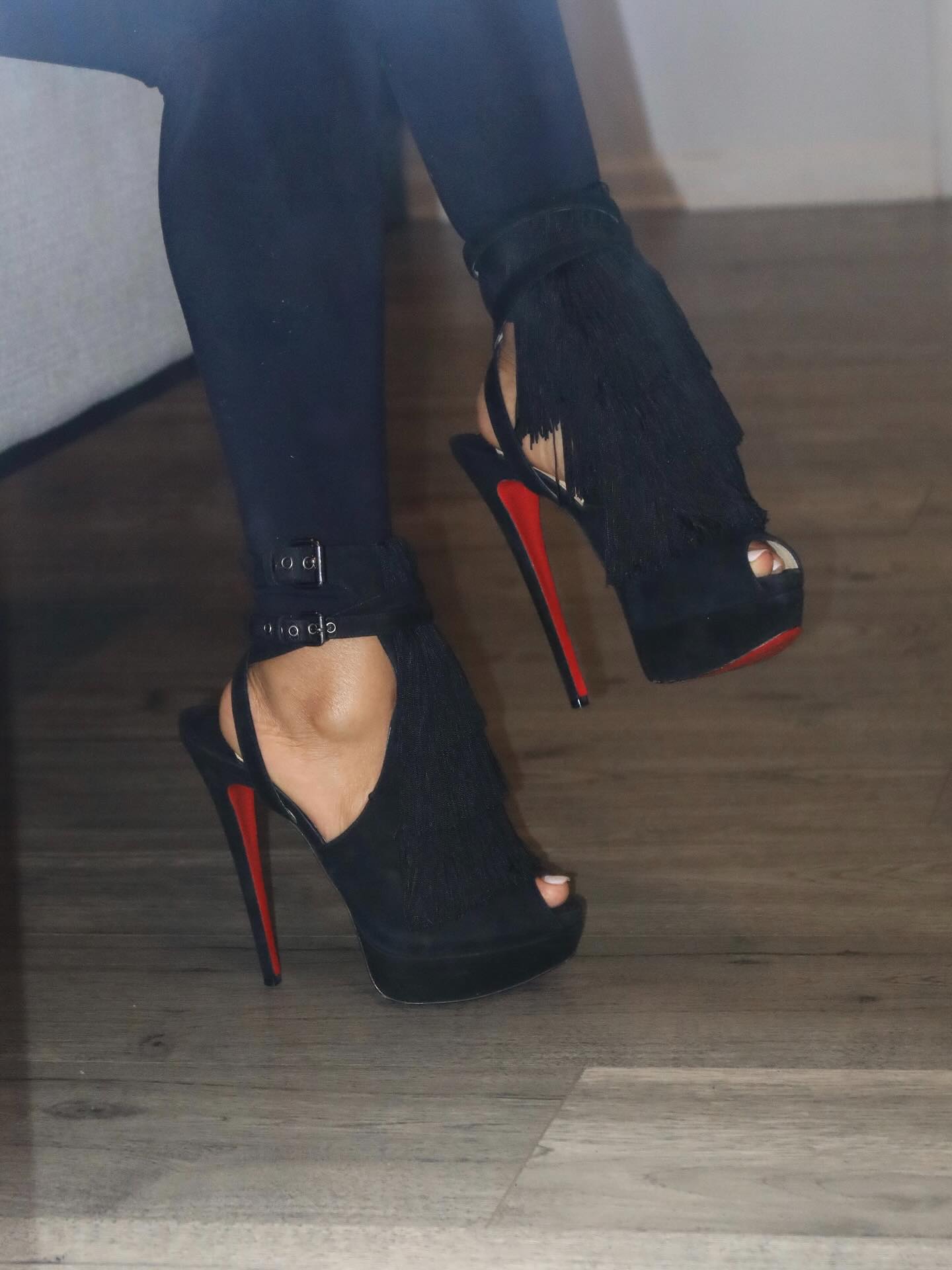 Black tassel high heels