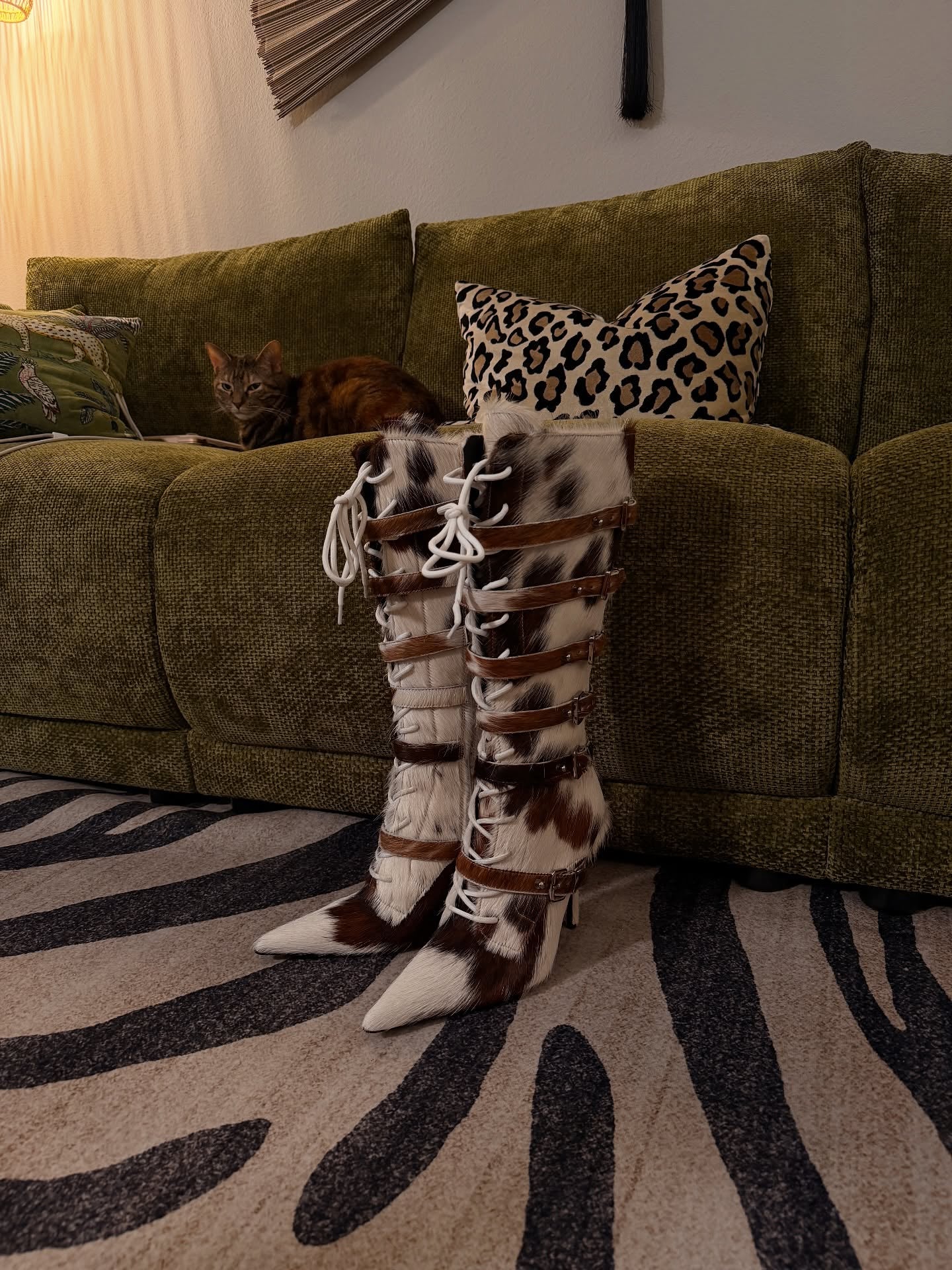 Black and white cow-strap high-heeled boots