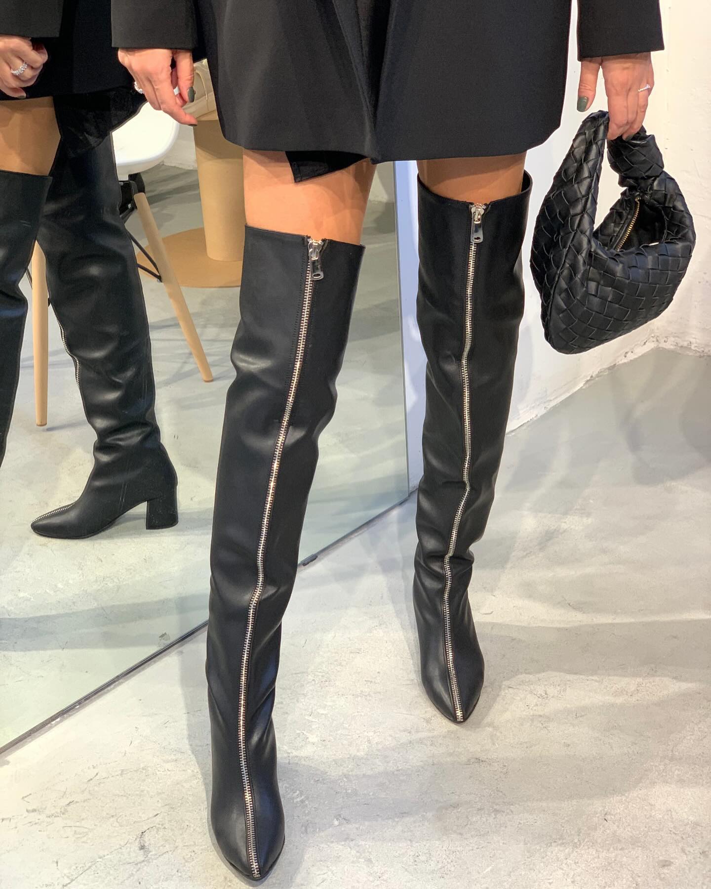 Black and silver zipper high boots