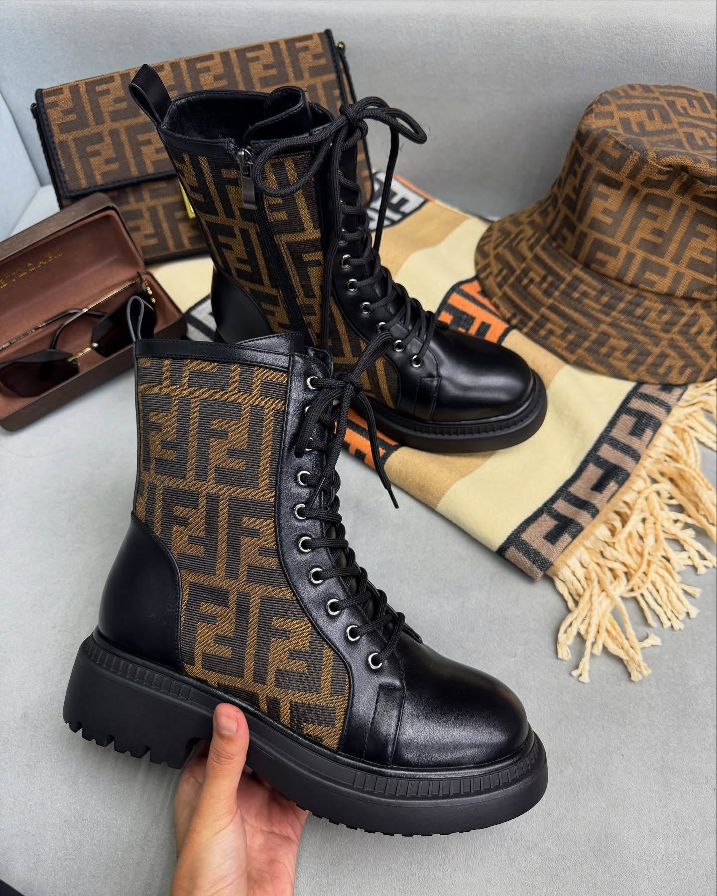 Embroidered brown modified black ankle boots