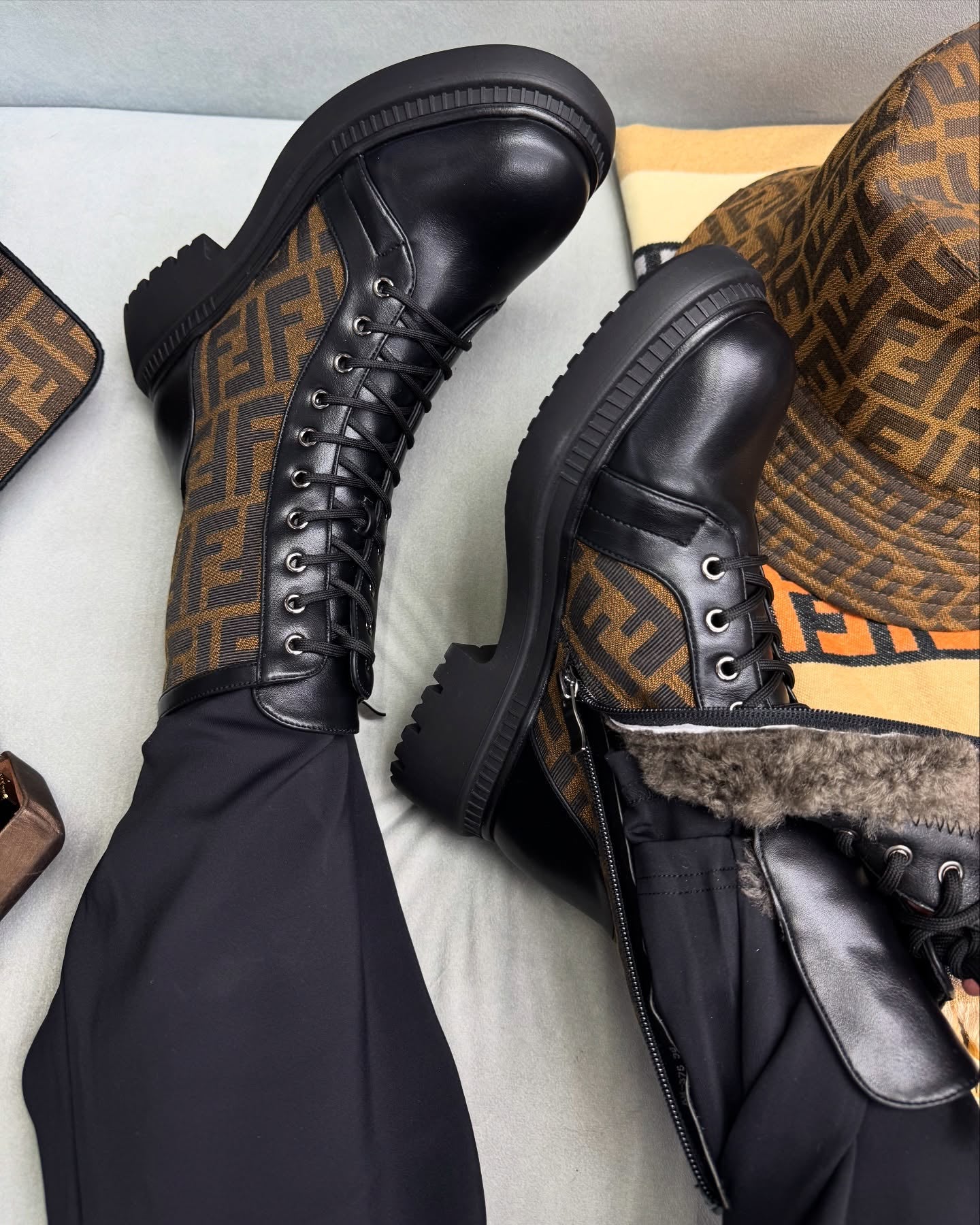 Embroidered brown modified black ankle boots