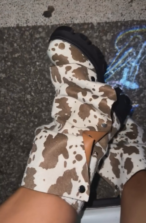 White and brown cow boots