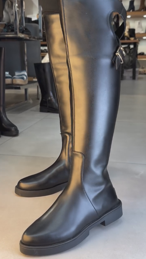 Black cross-strap leather high boots