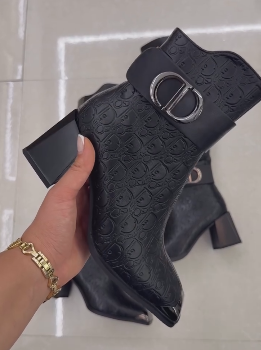 Black engraved iron toe ankle boots