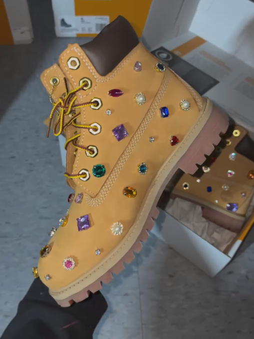 Colorful rhinestone-encrusted khaki leather boots