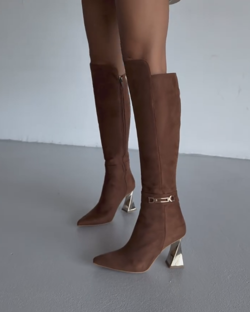 Gold rotating heel high boots
