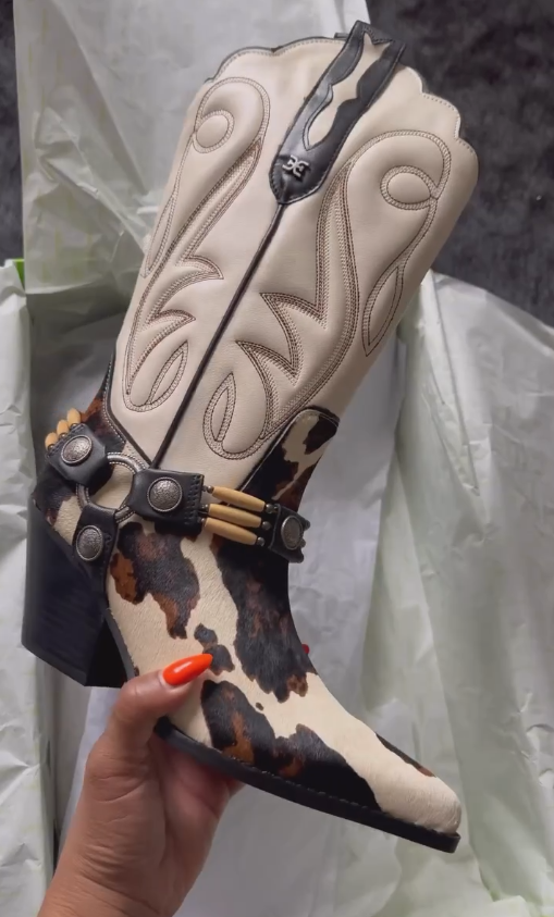 White and brown denim knee-high boots with metal buckles