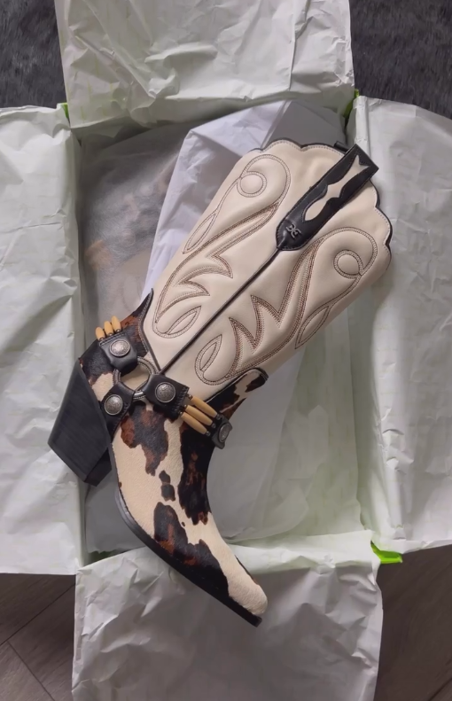 White and brown denim knee-high boots with metal buckles