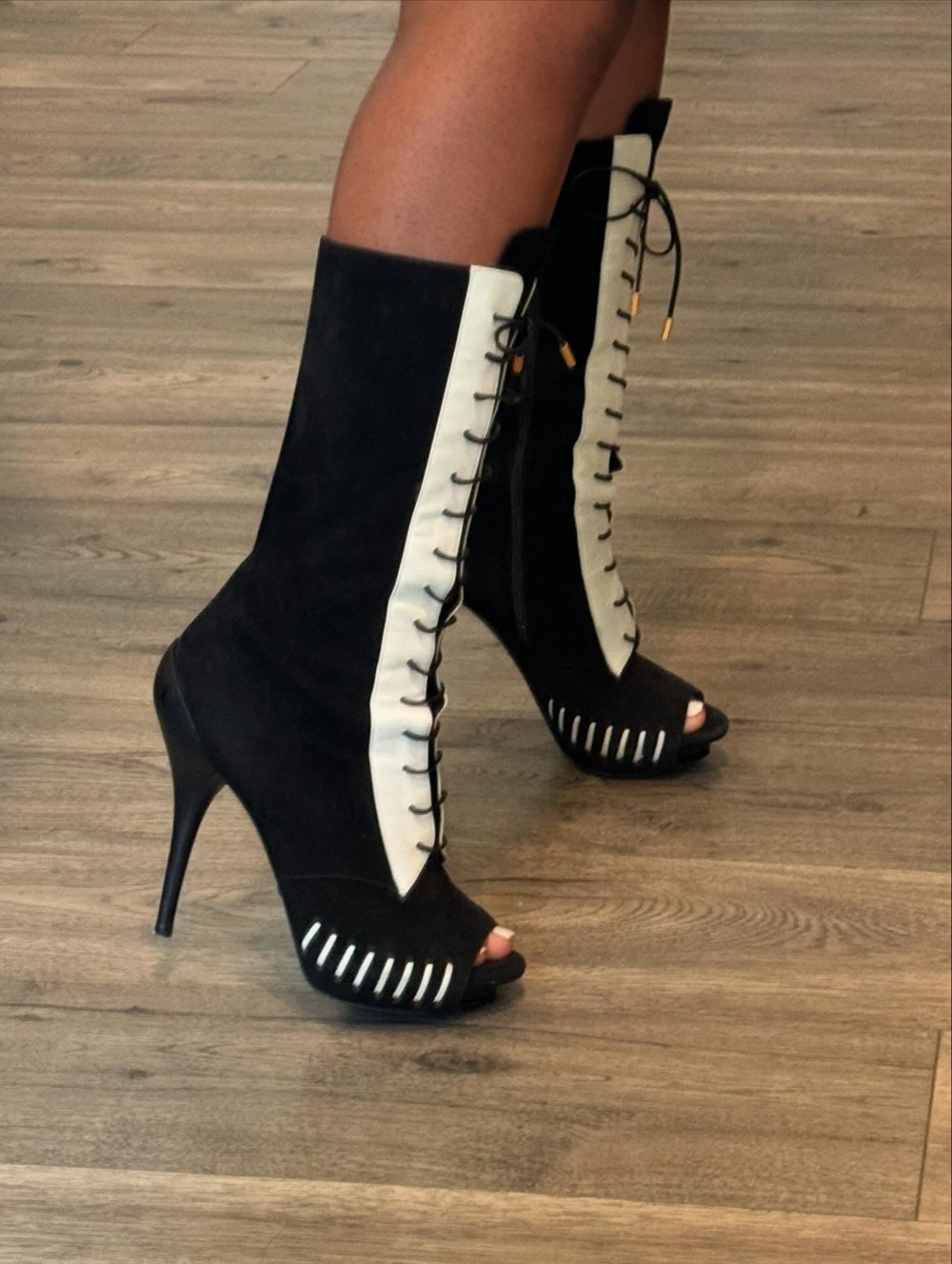 Black and white high-heeled boots