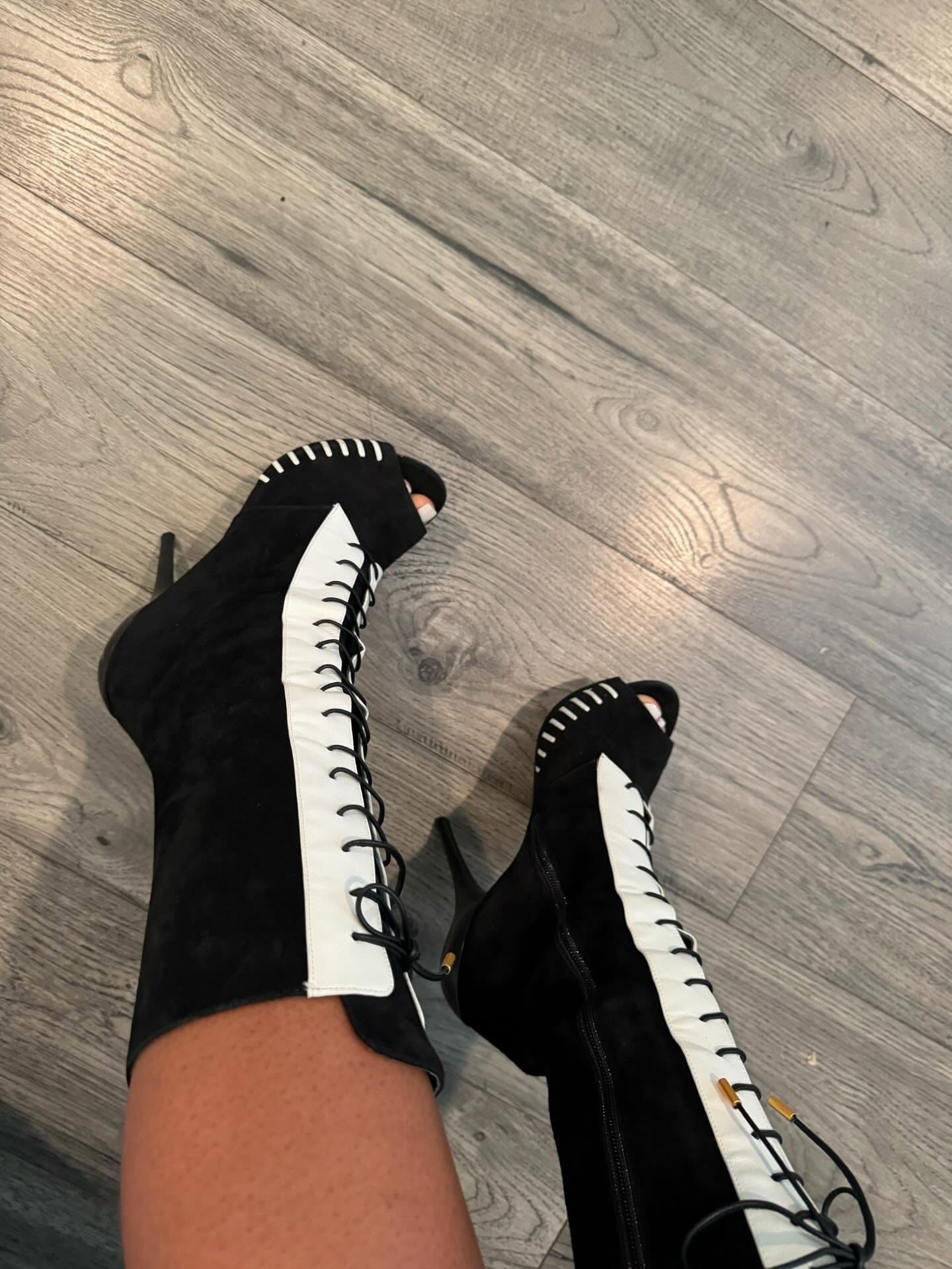 Black and white high-heeled boots