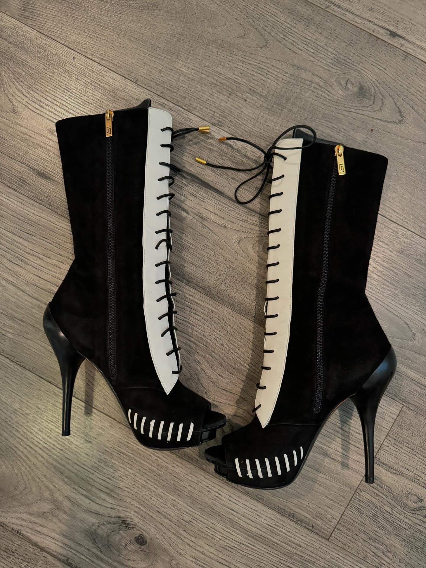 Black and white high-heeled boots