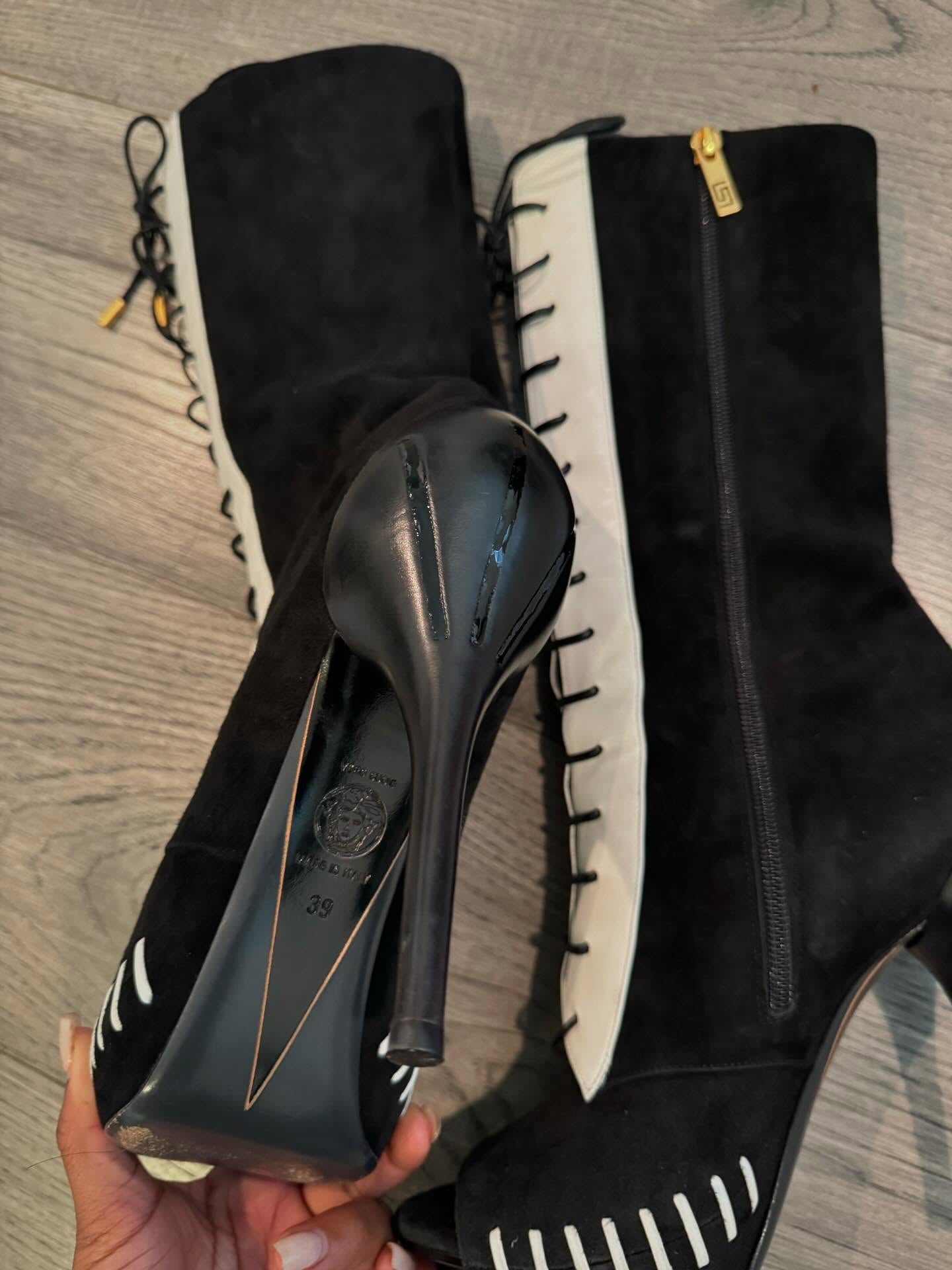 Black and white high-heeled boots