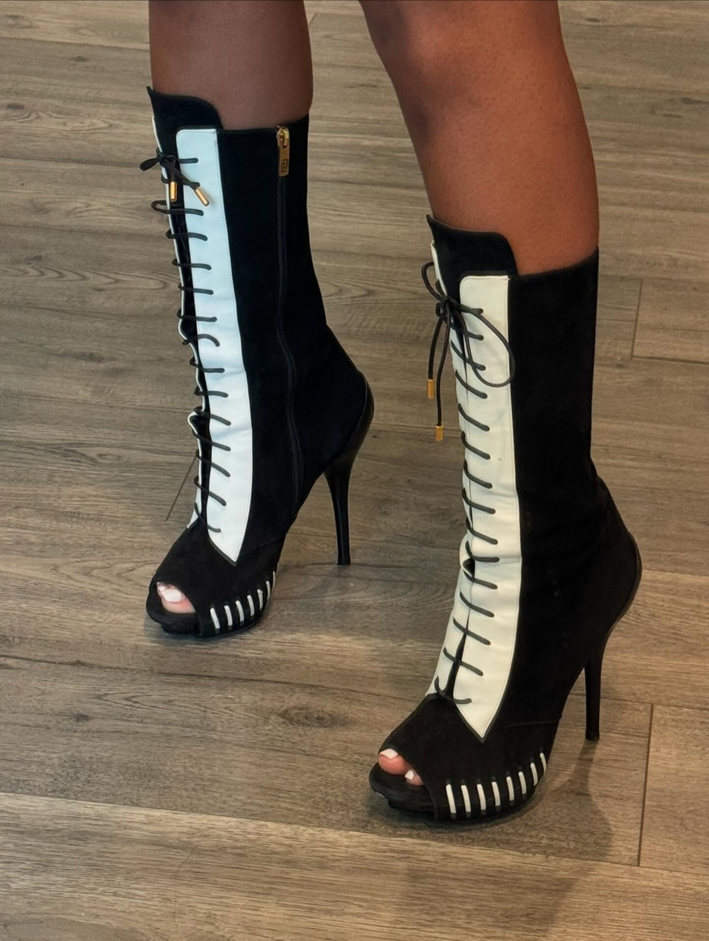 Black and white high-heeled boots