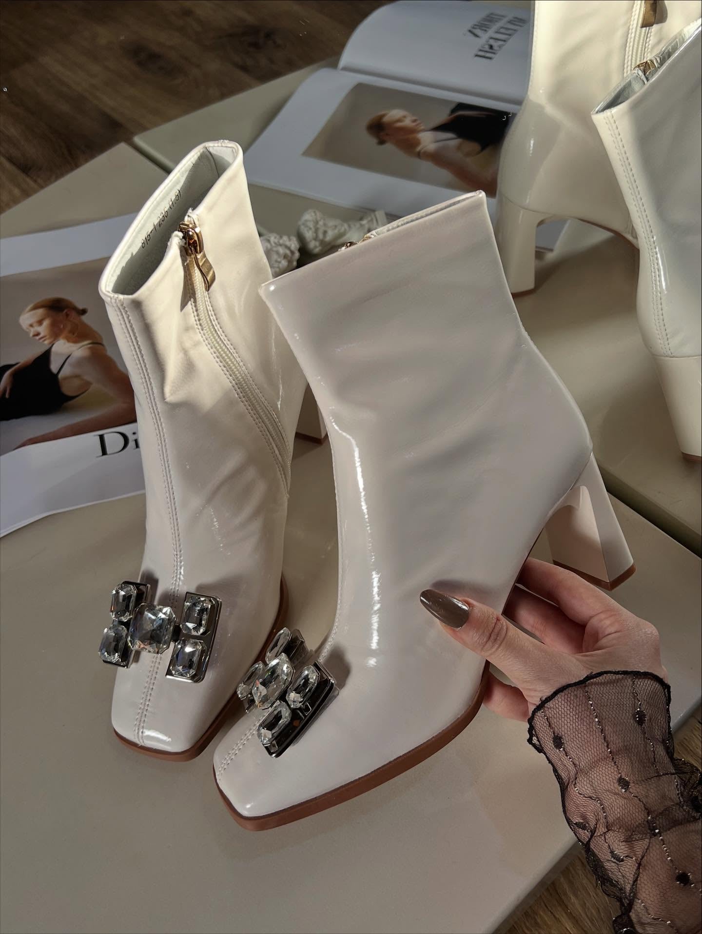 Gem-embellished cream boots