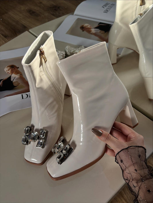 Gem-embellished cream boots